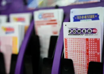Powerball and UK National Lottery displays signal expansion launch - AP Photo/George Walker IV, File