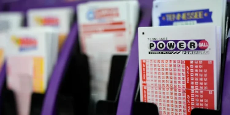 Powerball and UK National Lottery displays signal expansion launch - AP Photo/George Walker IV, File