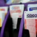Powerball and UK National Lottery displays signal expansion launch - AP Photo/George Walker IV, File