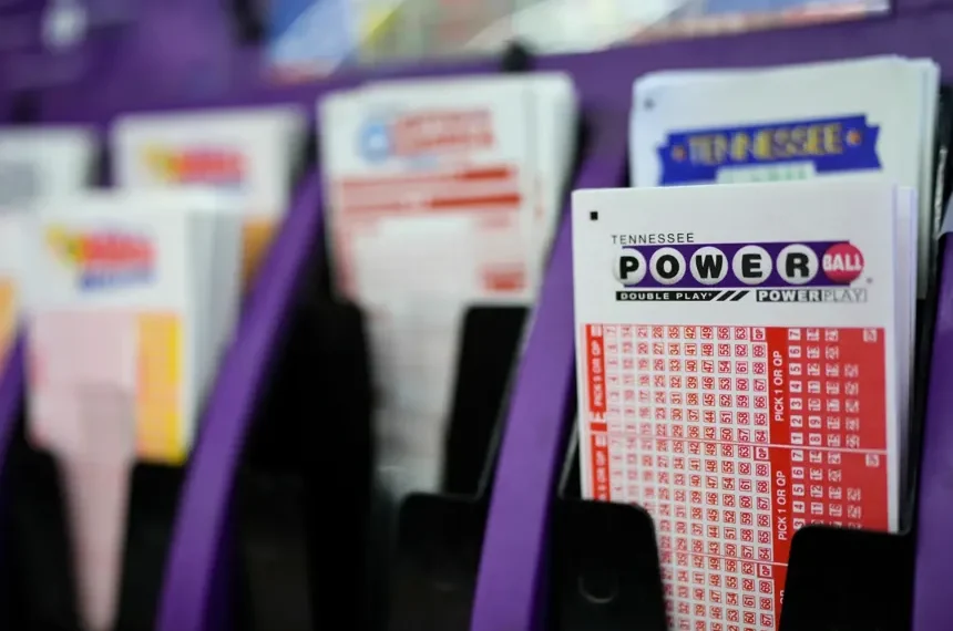 Powerball and UK National Lottery displays signal expansion launch - AP Photo/George Walker IV, File