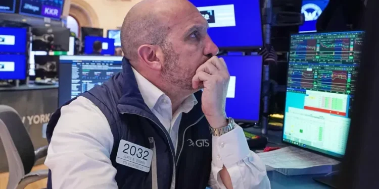 Traders react as oil prices rise and stocks fall on Iran tensions - AP Photo/Richard Drew