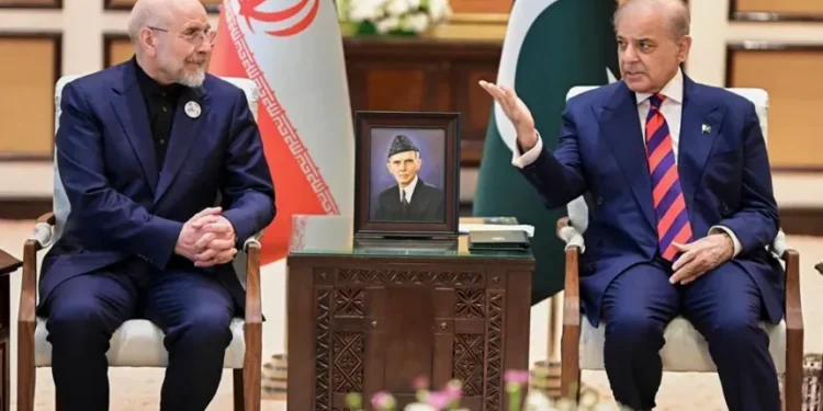 U.S. and Iranian delegations during ceasefire talks in Islamabad - Pakistan Prime Minister Office via AP