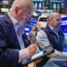 Wall Street trading floor reacting to oil price surge and tech stock decline - AP Photo/Richard Drew