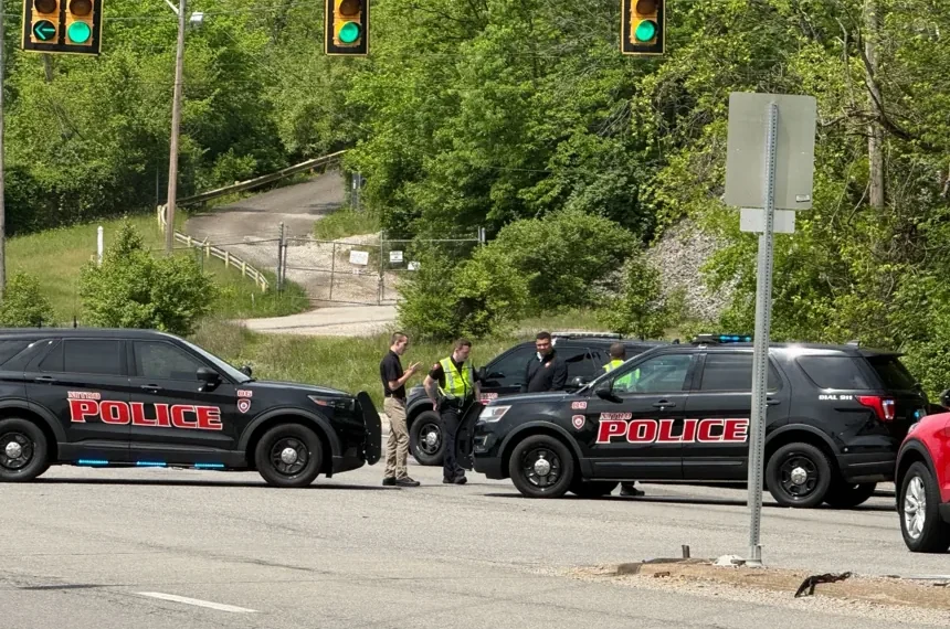 Emergency crews respond to chemical leak at West Virginia plant - AP Photo/John Raby
