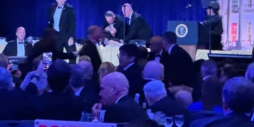 Security officers respond after gunfire near White House correspondents dinner venue - AP Photo/Mark Schiefelbein