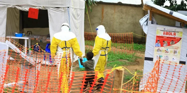 Health workers responding to Ebola outbreak in Ituri Congo - AP Photo/Al-hadji Kudra Maliro, File