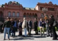 Journalists gather outside Argentina presidency after press access restored- AP Photo/Rodrigo Abd