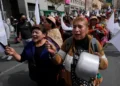Protesters march during anti-government demonstrations in La Paz, Bolivia - AP Photo/Juan Karita