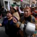 Protesters march during anti-government demonstrations in La Paz, Bolivia - AP Photo/Juan Karita
