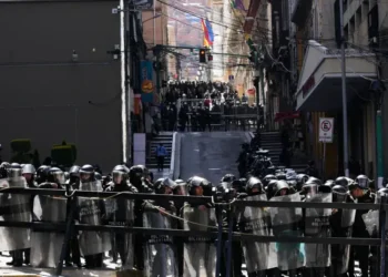Protesters clash with police during unrest in La Paz, Bolivia - AP Photo/Juan Karita