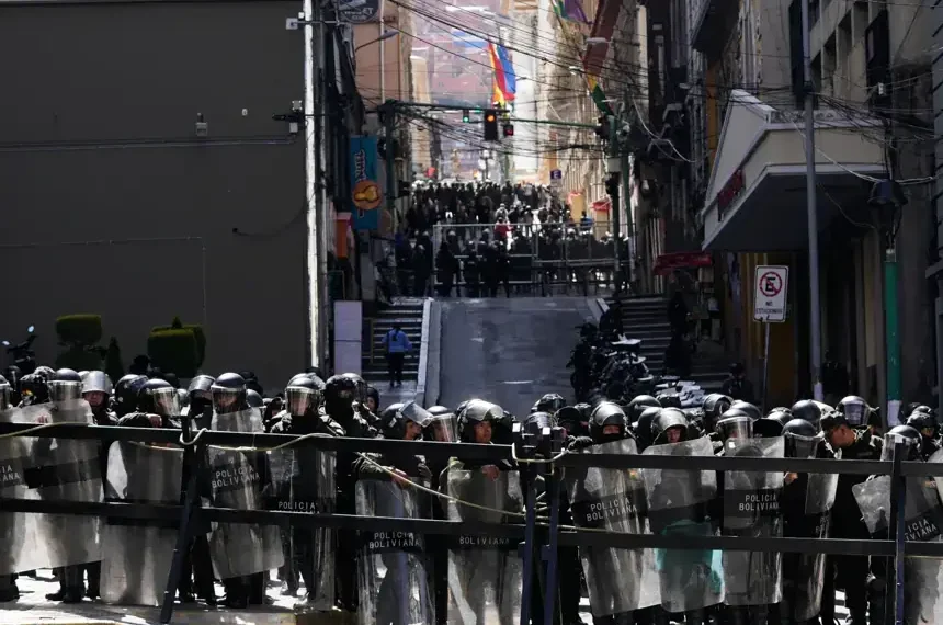 Protesters clash with police during unrest in La Paz, Bolivia - AP Photo/Juan Karita