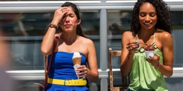 Person experiencing brain freeze after eating ice cream quickly - Credit: Getty Images