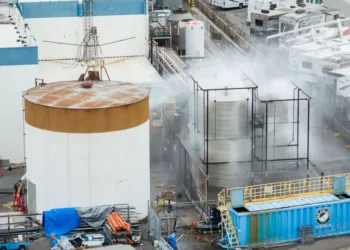 Emergency crews spray water on damaged chemical tank in California - AP Photo/Ethan Swope