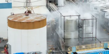Emergency crews spray water on damaged chemical tank in California - AP Photo/Ethan Swope