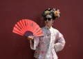 Visitors wearing imperial Chinese costumes near Beijing’s Forbidden City - AP Photo/Ng Han Guan