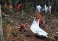 Investigators examine wreckage linked to the 2022 China Eastern plane crash - Lu Boan/Xinhua via AP, File