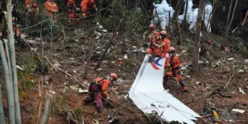 Investigators examine wreckage linked to the 2022 China Eastern plane crash - Lu Boan/Xinhua via AP, File