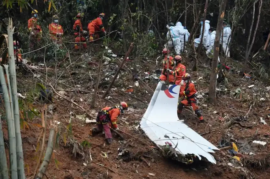Investigators examine wreckage linked to the 2022 China Eastern plane crash - Lu Boan/Xinhua via AP, File