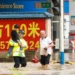 Rescue workers evacuate residents during severe flooding in China - Xiao Wei/Xinhua via AP