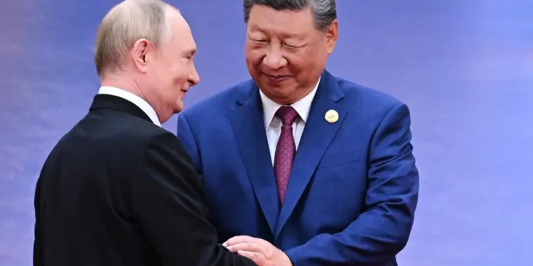 Vladimir Putin and Xi Jinping meeting in Beijing during diplomatic talks - Sergei Bobylev, Sputnik, Kremlin Pool Photo via AP, File
