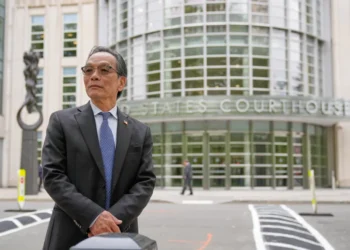 Supporters gather outside New York court during Chinese outpost trial - AP Photo/Seth Wenig