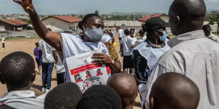 Health workers in protective gear respond to Ebola outbreak in eastern Congo - AP Photo/Moses Sawasawa
