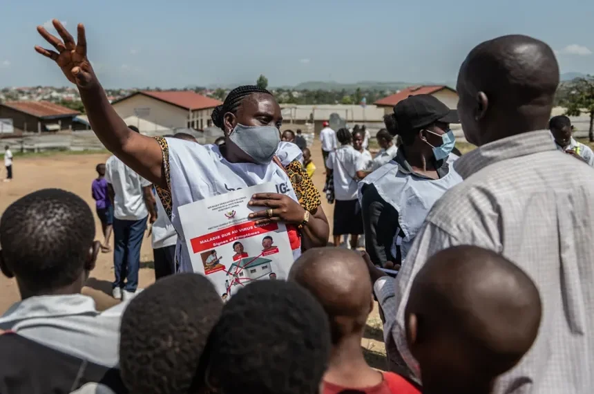 Health workers in protective gear respond to Ebola outbreak in eastern Congo - AP Photo/Moses Sawasawa
