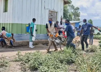 Health workers in protective gear responding to Ebola outbreak in Congo - AP Photo/Dirole Lotsima Dieudonne