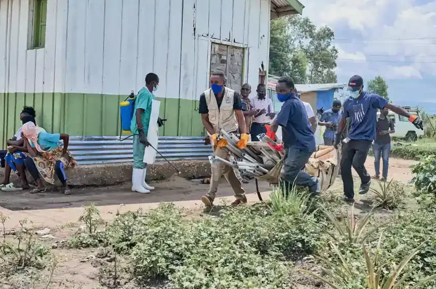 Health workers in protective gear responding to Ebola outbreak in Congo - AP Photo/Dirole Lotsima Dieudonne