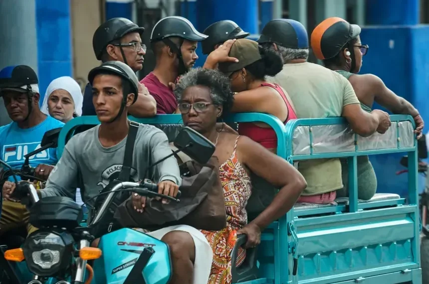 People walk through Havana amid new US sanctions on Cuba - AP Photo/Ramon Espinosa