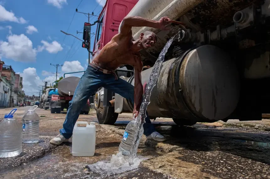 Residents in Cuba struggle with worsening water shortages and blackouts - AP Photo/Ramon Espinosa