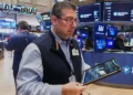 Traders react as Dow rises above 50000 on Cisco earnings - AP Photo/richard Drew