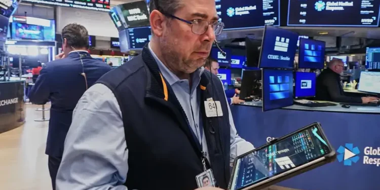 Traders react as Dow rises above 50000 on Cisco earnings - AP Photo/richard Drew
