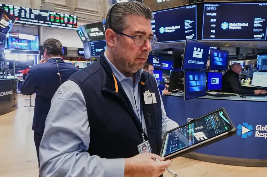 Traders react as Dow rises above 50000 on Cisco earnings - AP Photo/richard Drew