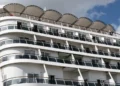 Cruise ship passengers disembarking after gastroenteritis outbreak in France - AP Photo/Caroline Blumberg