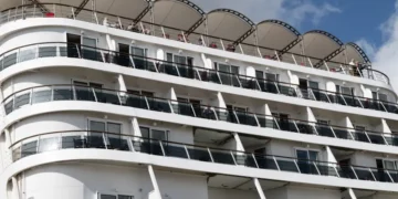 Cruise ship passengers disembarking after gastroenteritis outbreak in France - AP Photo/Caroline Blumberg