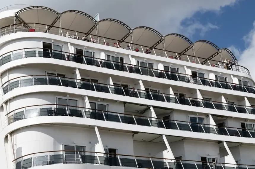Cruise ship passengers disembarking after gastroenteritis outbreak in France - AP Photo/Caroline Blumberg