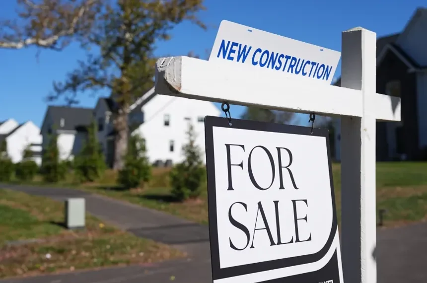 Young women reviewing housing listings amid rising U.S. home prices - AP Photo/Matt Rourke, File