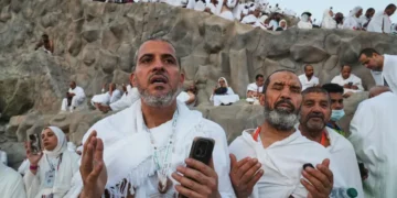 Muslim pilgrims gather near the Kaaba during the annual Hajj pilgrimage - AP Photo/Amr Nabil, File