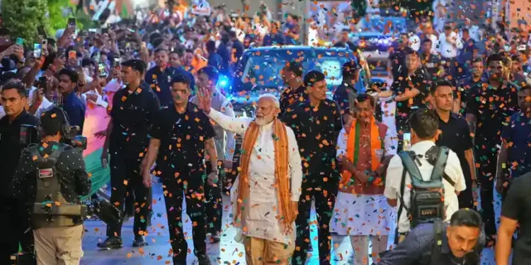 BJP supporters celebrate West Bengal election victory in India - AP Photo/Manish Swarup