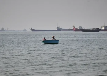 Commercial ships sail near the Strait of Hormuz amid rising regional tensions - Razieh Poudat/ISNA via AP