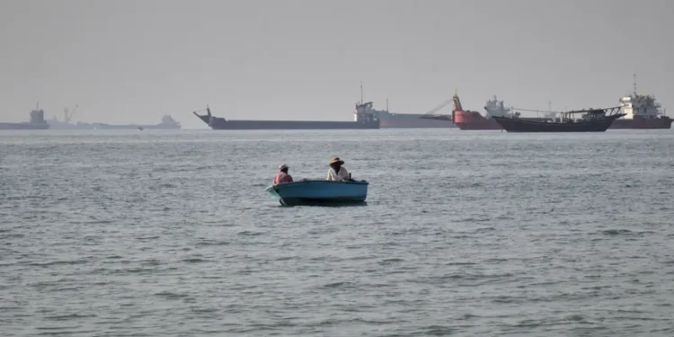 Commercial ships sail near the Strait of Hormuz amid rising regional tensions - Razieh Poudat/ISNA via AP