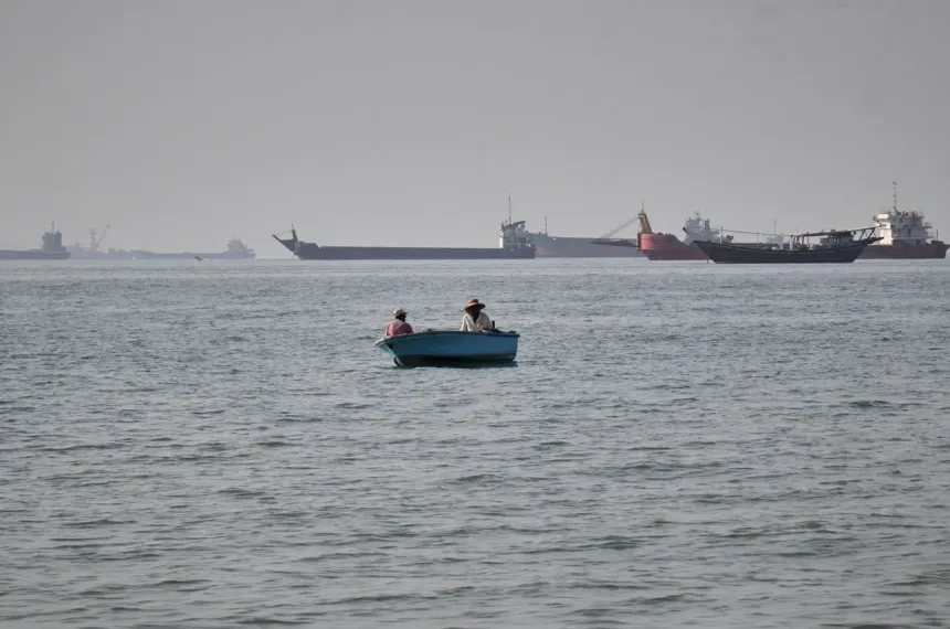 Commercial ships sail near the Strait of Hormuz amid rising regional tensions - Razieh Poudat/ISNA via AP
