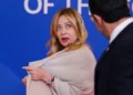 Giorgia Meloni responding to AI-generated deepfake controversy in Italy - Yves herman/Pool Photo via AP