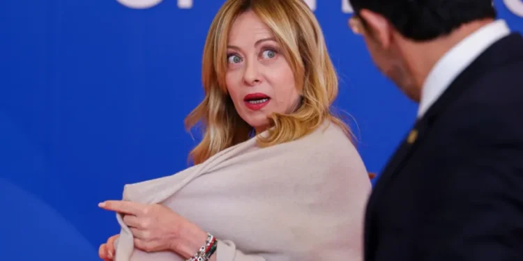 Giorgia Meloni responding to AI-generated deepfake controversy in Italy - Yves herman/Pool Photo via AP