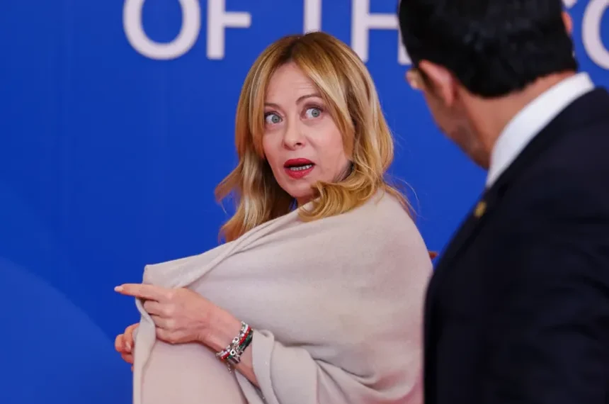 Giorgia Meloni responding to AI-generated deepfake controversy in Italy - Yves herman/Pool Photo via AP