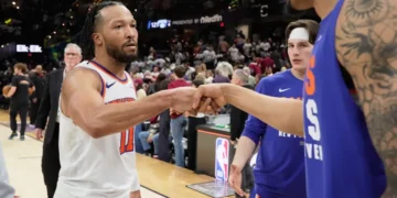 Jalen Brunson celebrates during Knicks playoff win over Cavaliers - AP Photo/Sue Ogrocki