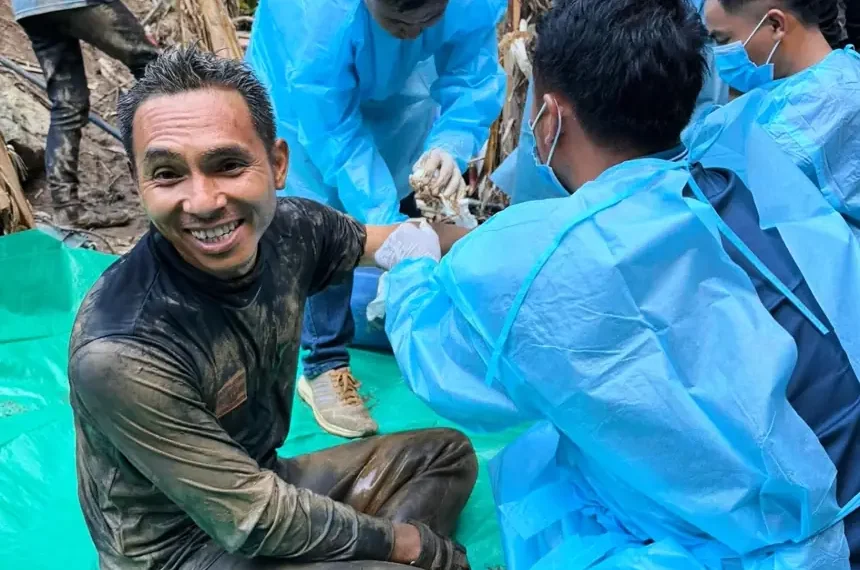 Rescue divers search flooded cave in central Laos for missing villagers - Metta Tham Rescue Kalasin via AP