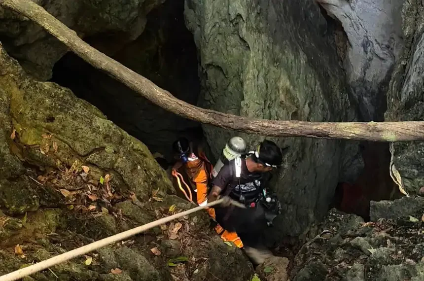 Rescue divers search flooded cave for missing villagers in Laos - Metta Tham Rescue Kalasin via AP