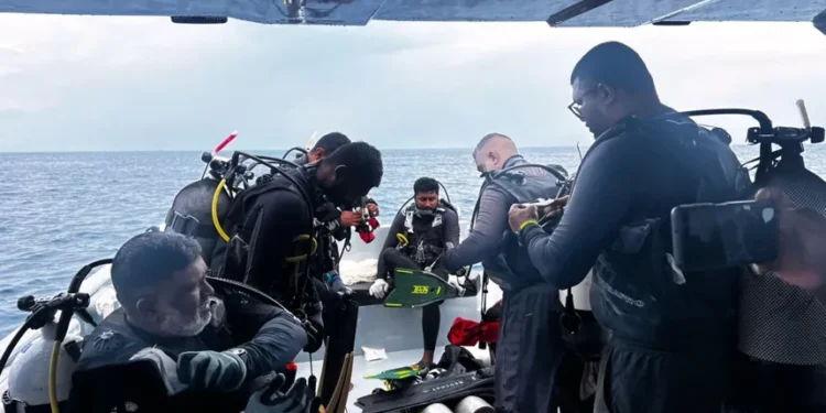 Rescue divers preparing for underwater cave search operations in the Maldives - Maldives, President Media Division via AP
